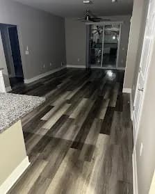Fresh grey LVP flooring, open concept