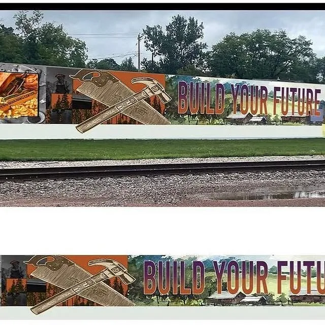 A detail from the Build Your Future mural on the side of the Builders Corner showroom in Wausau, painted by Stephanie Kohli in June 2023.